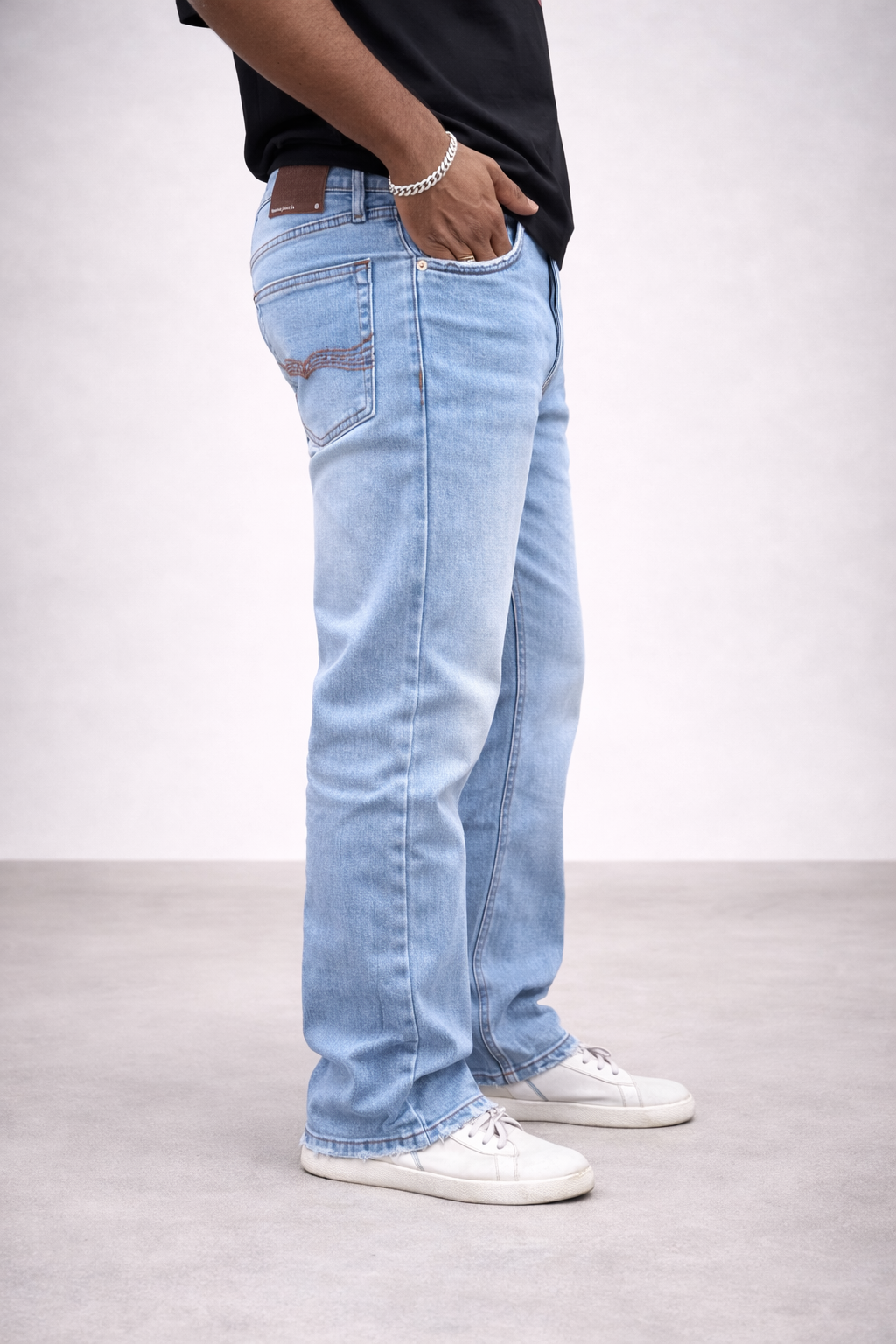 Ice blue straight-fit jeans, front pocket and coin pocket area in light wash denim