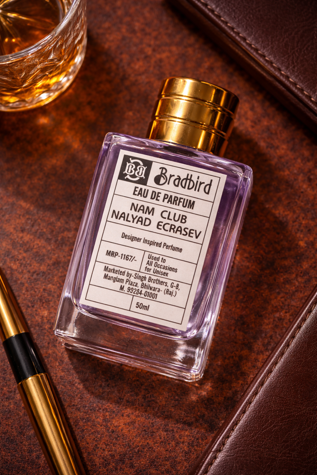 Angled Eau de Parfum bottle with gold cap—Nam Club Nayyad Ecrasev, 50 ml