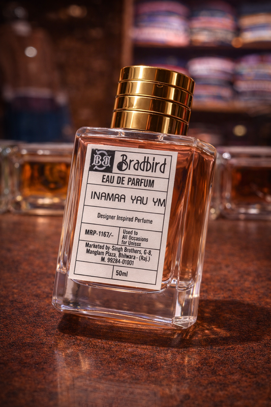 Inamra Yau YM Eau de Parfum 50ml bottle, angled view, gold cap and label panel