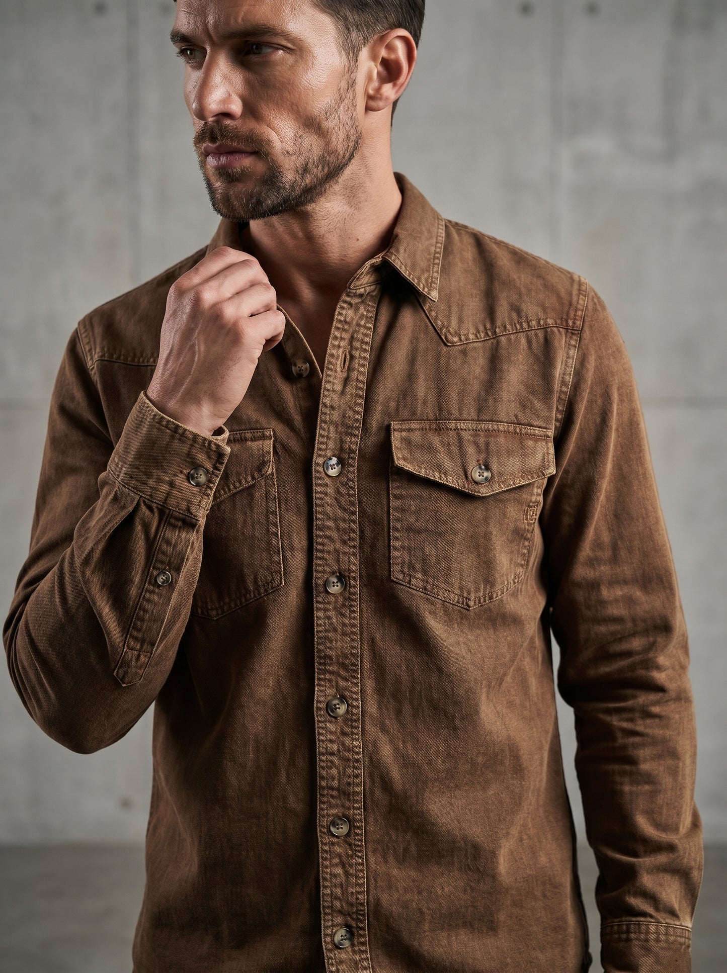Brown denim western shirt with pointed collar, chest flap pocket, and snap button front.