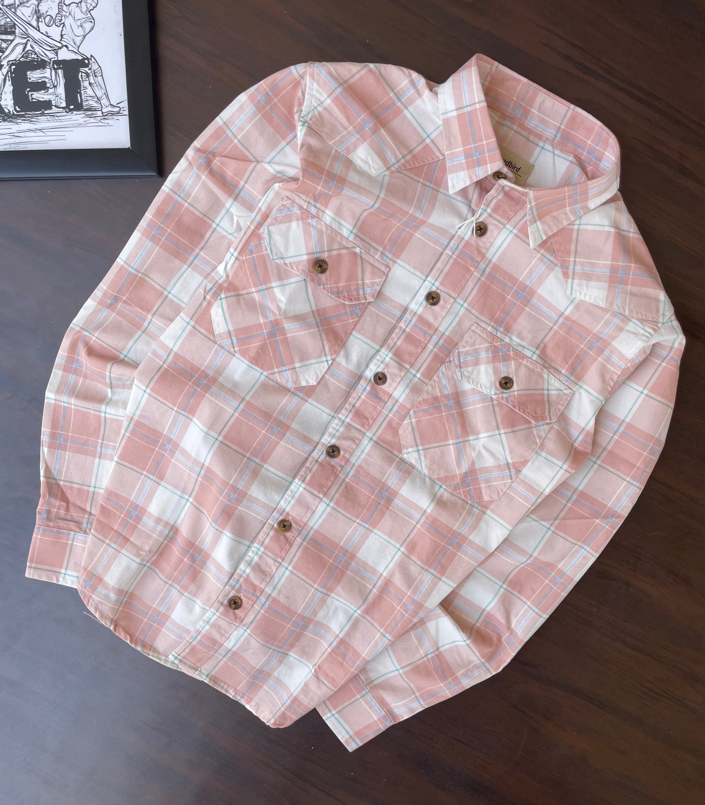 Peach and white plaid button-up western shirt, flat lay showing double chest pockets