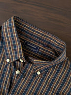 Inside neckline label on mustard & navy multi-check button-up shirt