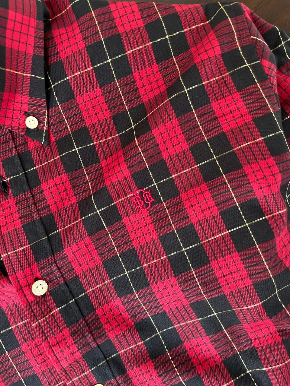Red and black buffalo check button-up shirt with small logo embroidery on chest