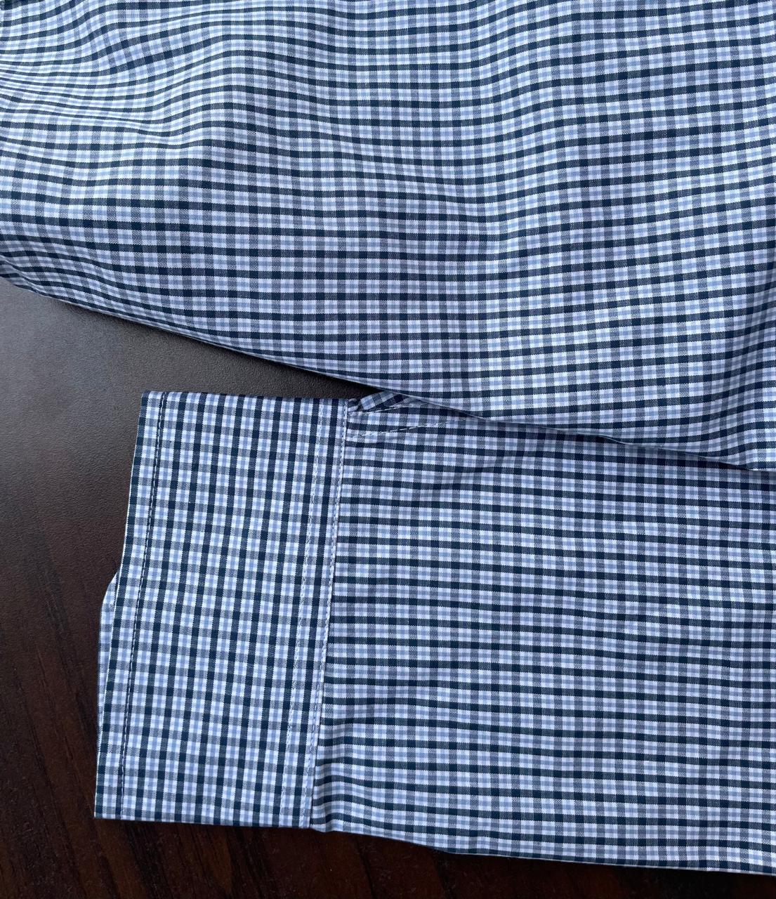 Sky blue micro-check shirt sleeve and cuff with buttoned detail