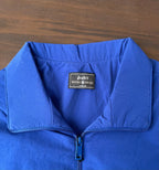 Windbreaker inner collar and size label; royal blue fabric with zip front view