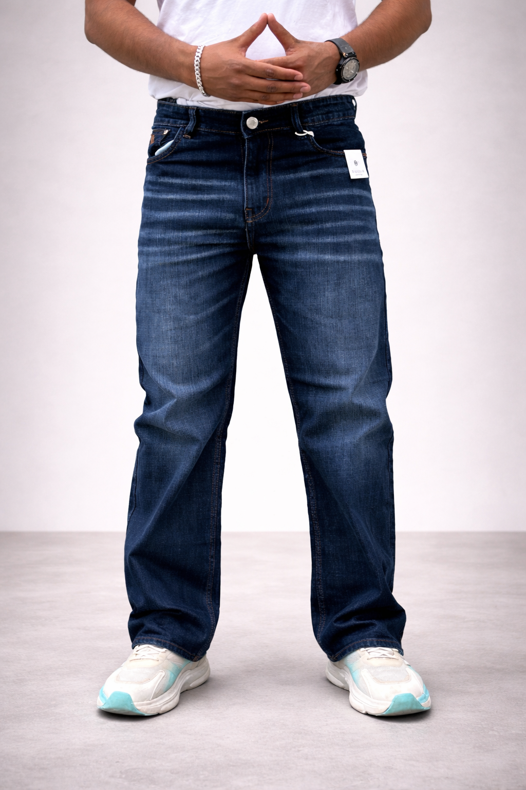 Straight-leg dark blue jeans, vintage wash, button closure, visible front pockets