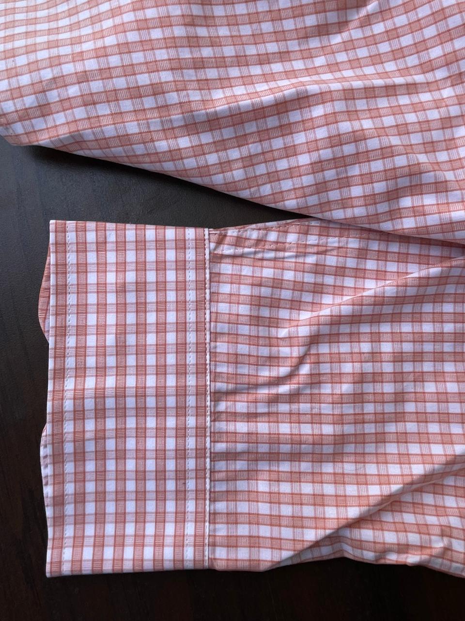 Peach gingham check shirt hem and cuff detail, button front