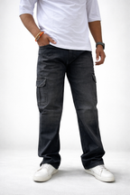 Men’s dark wash denim cargo jeans with side cargo pockets and roomy relaxed leg