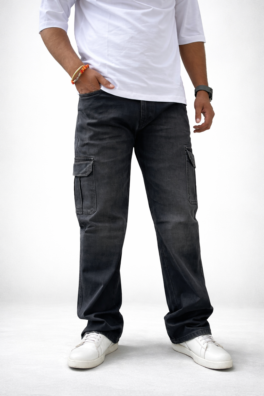 Men’s dark wash denim cargo jeans with side cargo pockets and roomy relaxed leg