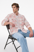 Dusty pink plaid slim western shirt with two chest pockets and snap buttons