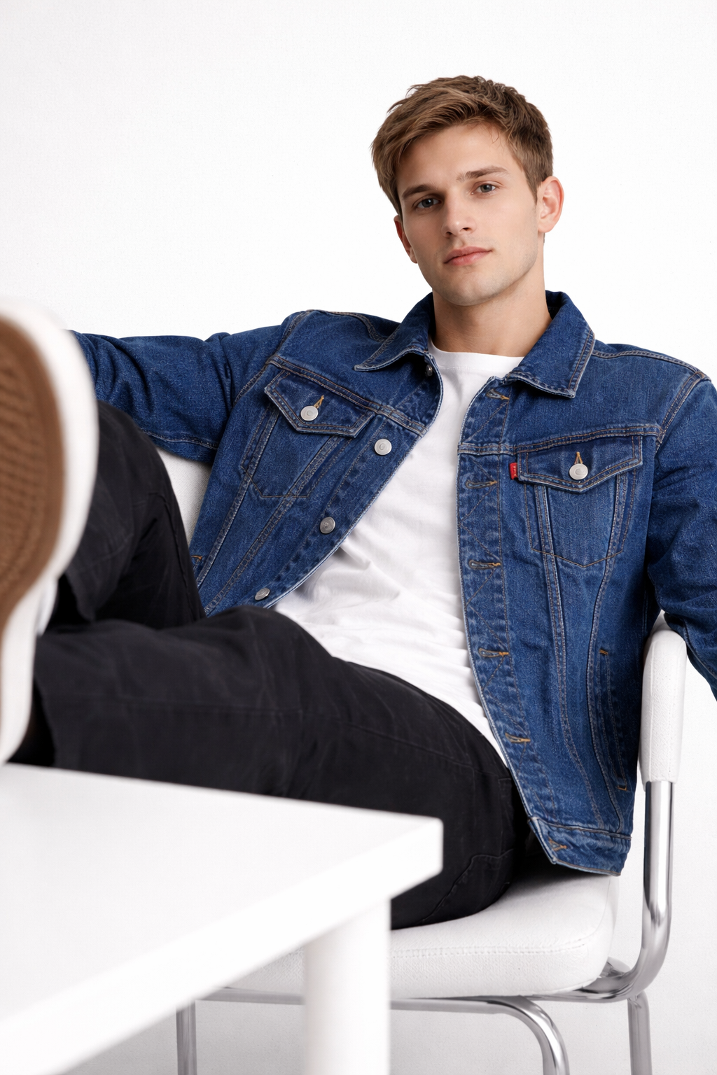 Men's dark-wash denim trucker jacket with button front and chest pockets
