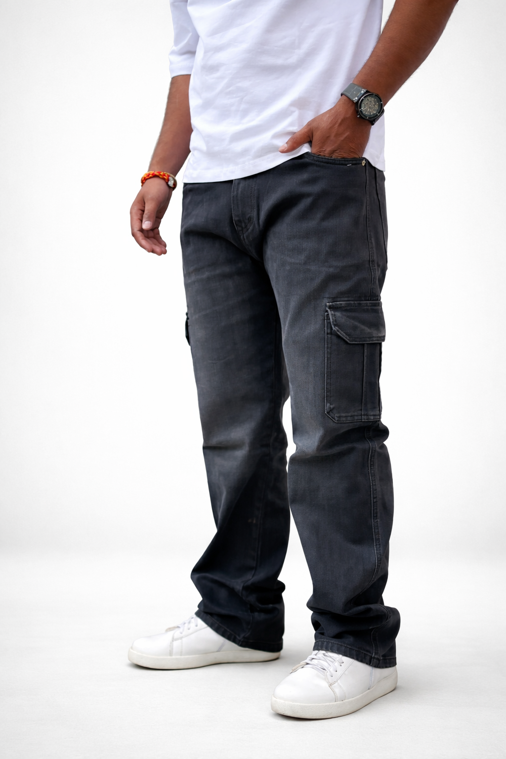 Dark denim cargo jeans with rectangular front cargo pockets and relaxed straight fit
