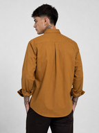 Mustard oxford button-up shirt shown from back, full-length sleeves