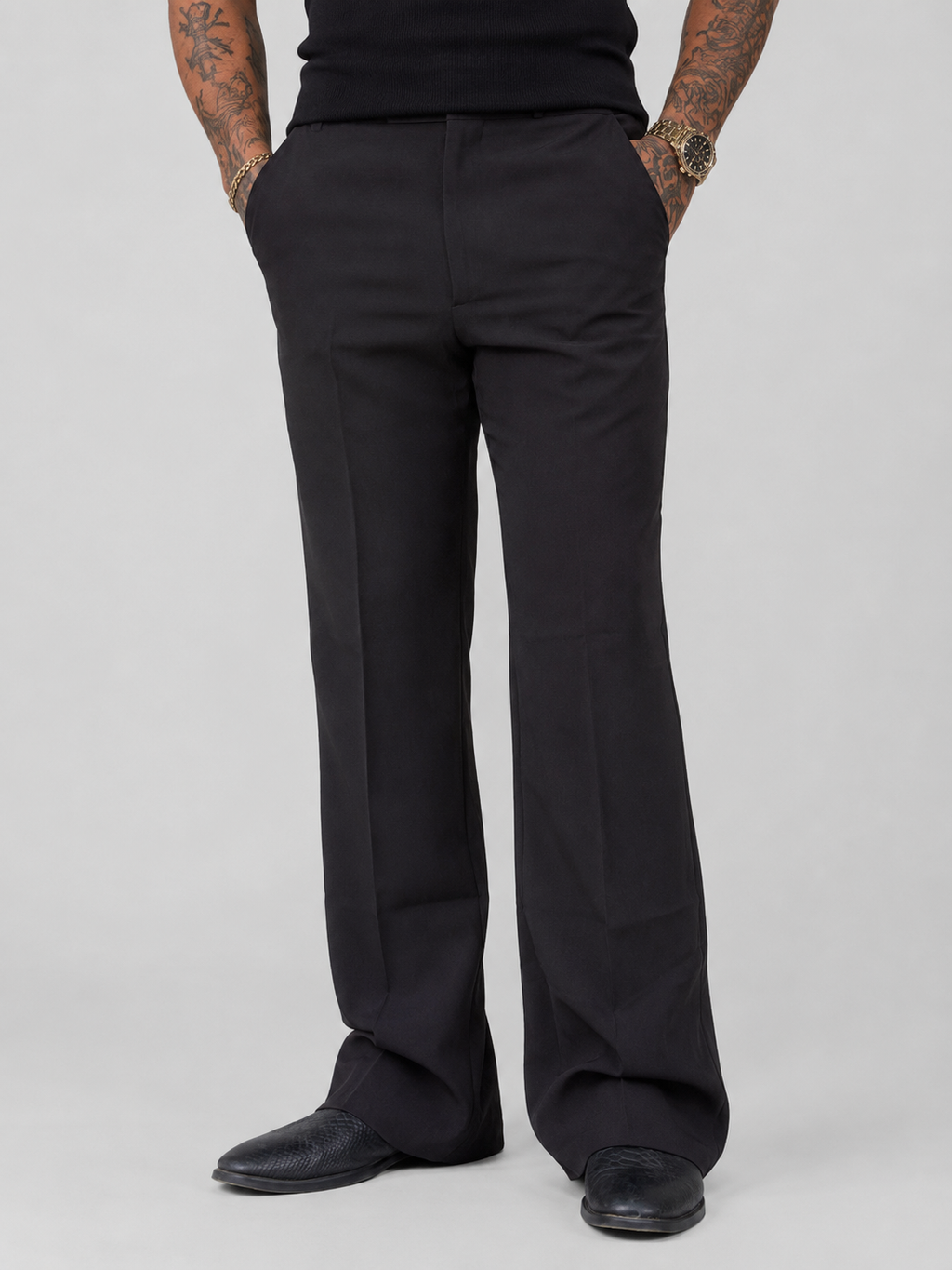 Black wide-leg structured pants with back yoke and stitched seams