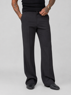 Black wide-leg relaxed pants with buttoned waistband and side pockets