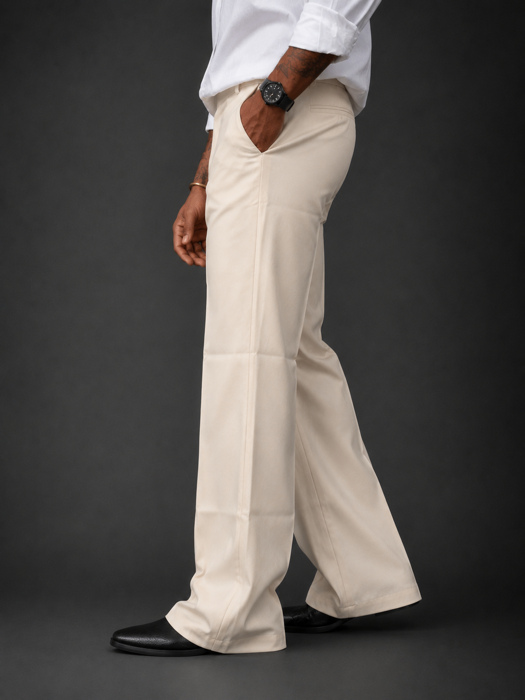 Ecru relaxed-fit structured pants, side profile with belt loops and flat front