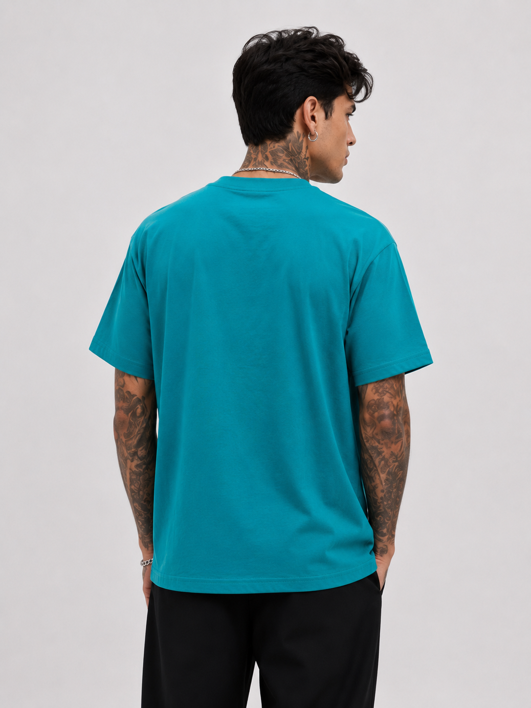 Turquoise motocross tee, back view, short sleeves and round neck