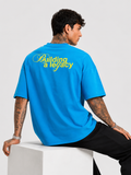Blue drop-shoulder T-shirt with yellow back print and short sleeves