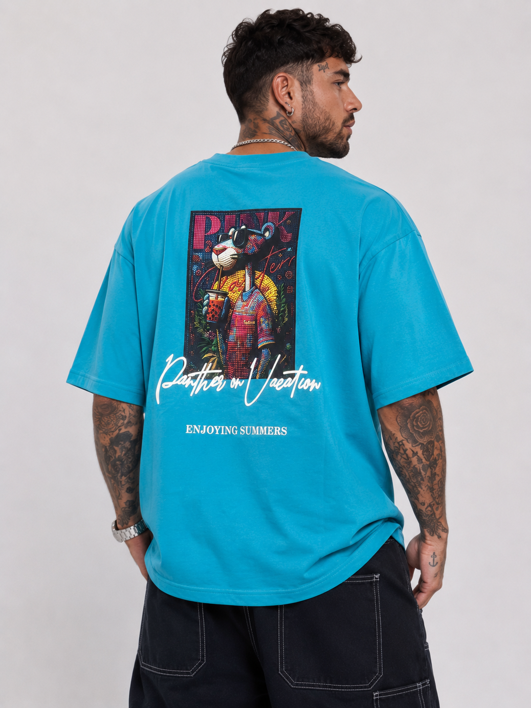 Cerulean blue drop-shoulder graphic shirt with large back print