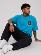 Cerulean blue drop-shoulder graphic shirt with small front chest print