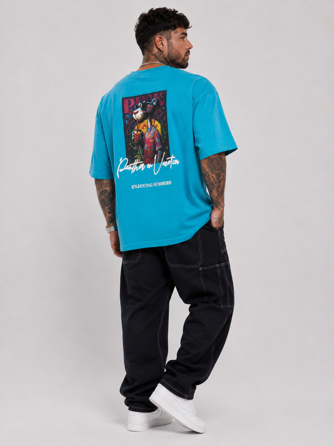 Cerulean blue drop-shoulder graphic shirt with large back logo print