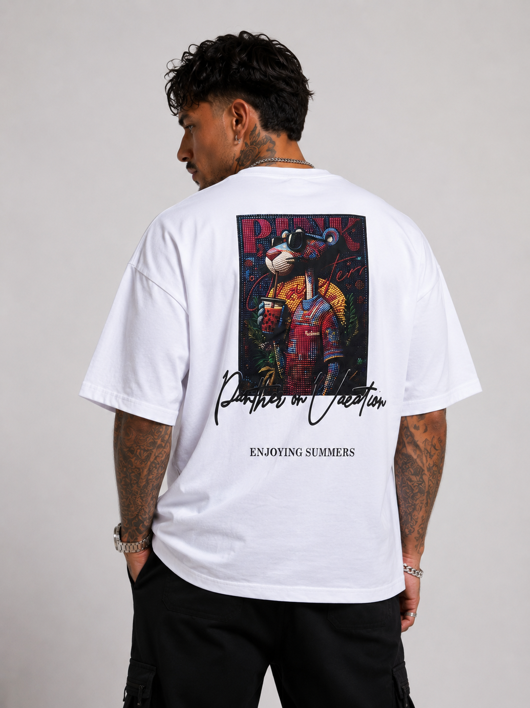 Off-white drop-shoulder tee with large back graphic and ENJOYING SUMMERS text