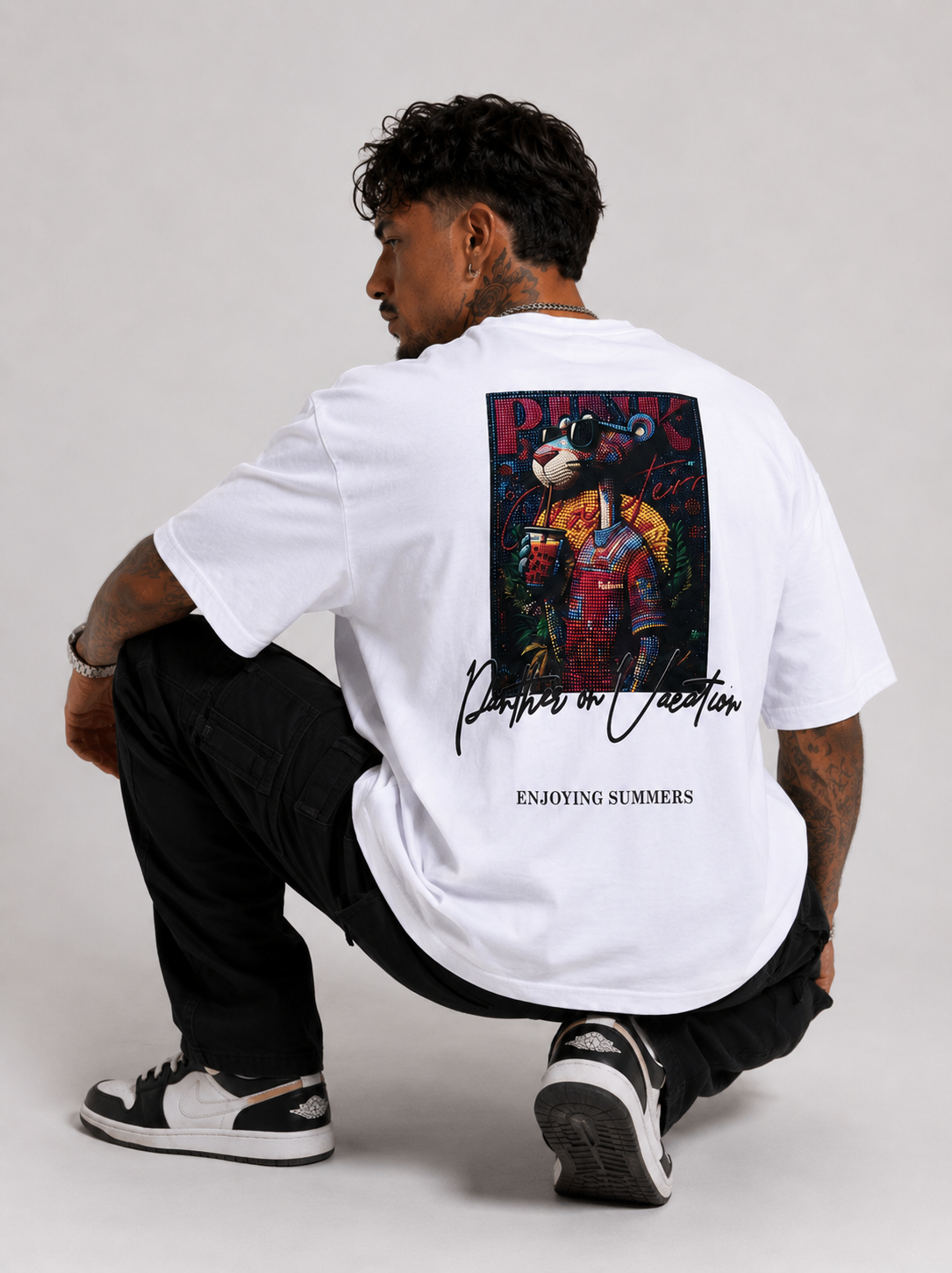 Off-white drop-shoulder tee with large back artwork and ENJOYING SUMMERS text