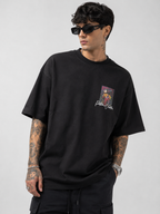 Matte black heavyweight drop-shoulder tee with small front graphic