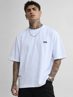 Off-white drop-shoulder T-shirt with small BBD logo at left chest