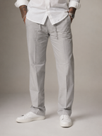 Light gray linen straight-fit pants, relaxed leg with front and back pockets