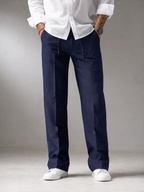 Midnight navy linen straight-fit trousers with front creases, cuffed hem and side pockets