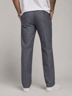 Dark grey linen trousers, relaxed straight legs, back yoke and hem cuff