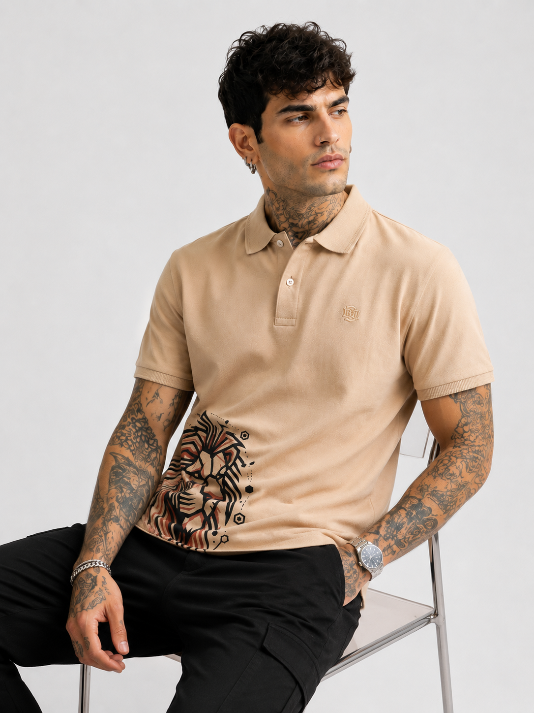 Beige polo shirt with lion graphic, button placket and ribbed collar