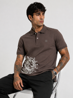 Brown polo T-shirt with short sleeves, button collar, and white lion artwork front