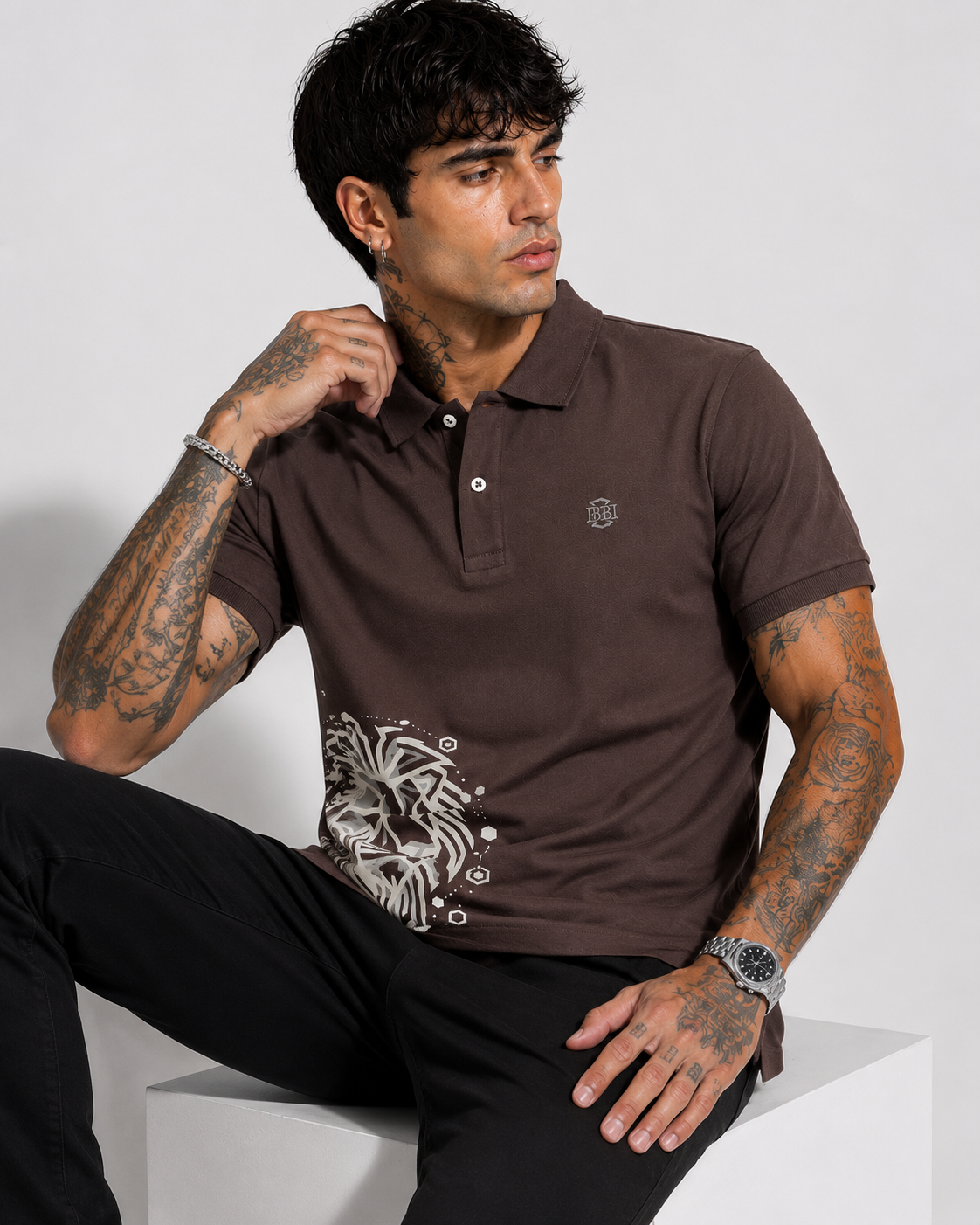 Brown polo T-shirt with button collar and white abstract lion graphic on chest