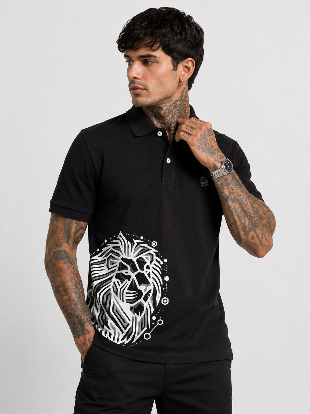 Black polo shirt with large lion graphic print on chest and buttoned collar