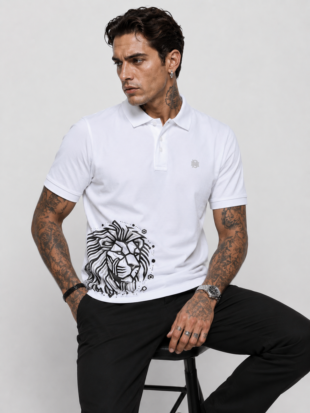 White polo shirt with ribbed collar, button placket, and black lion graphic on chest
