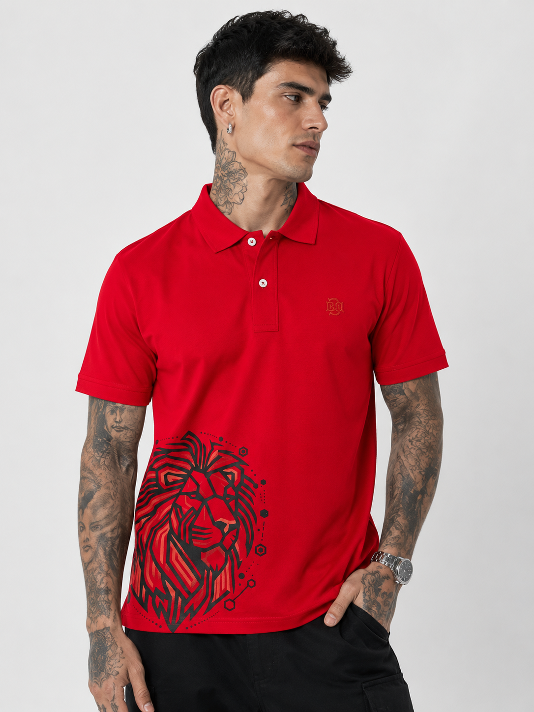 Red Lion red polo shirt with lion graphic near hem and embroidered chest logo