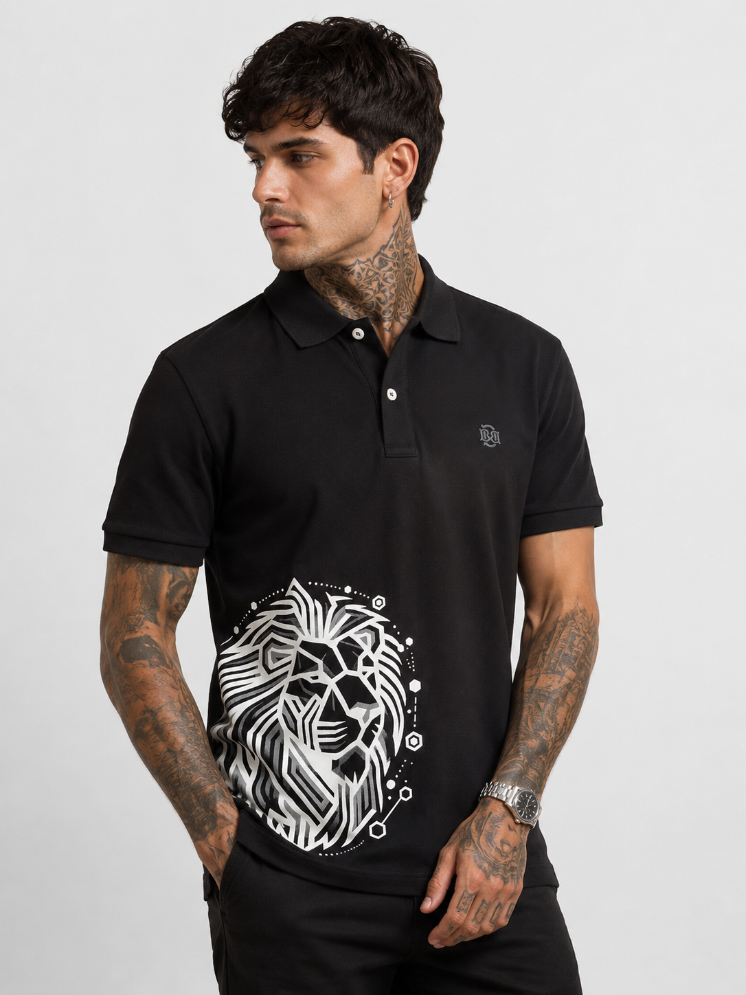 Black polo shirt with lion graphic on chest and buttoned collar
