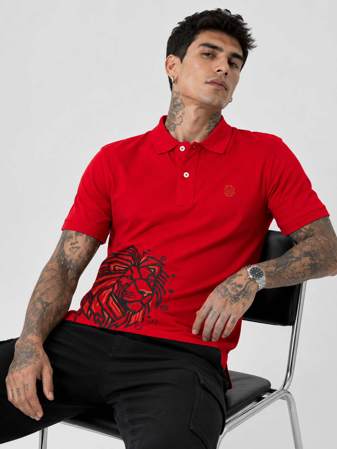 Red Lion graphic polo shirt in red with short sleeves and buttoned placket
