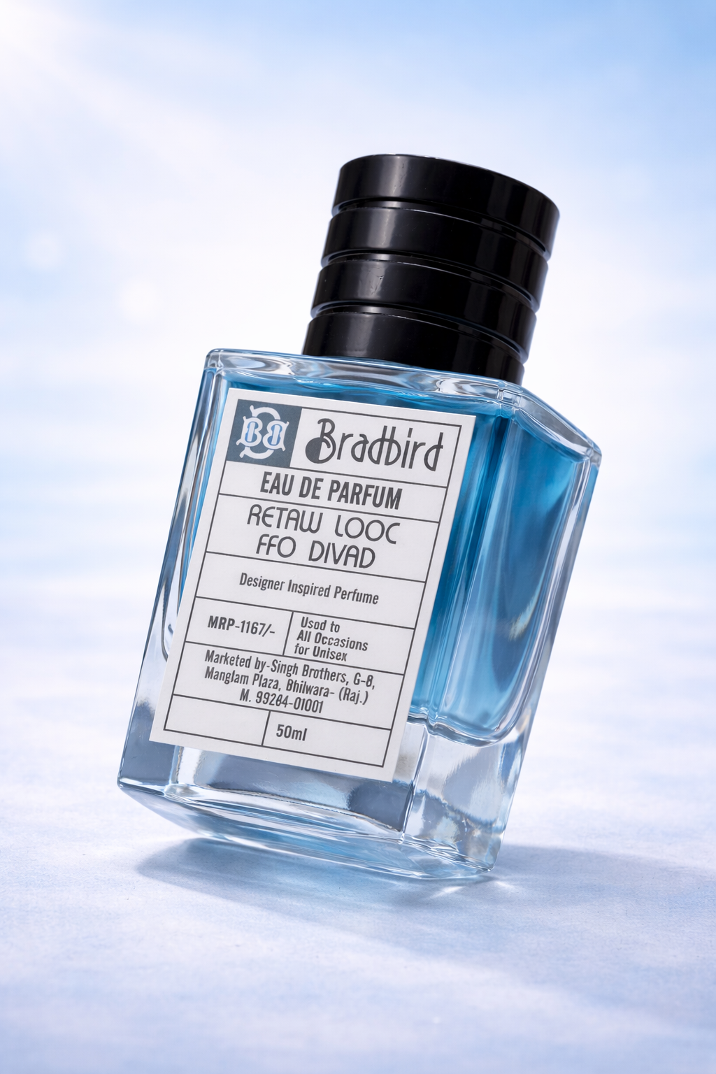 Eau de Parfum bottle, blue-tinted liquid, black cap, 50ml, label facing left