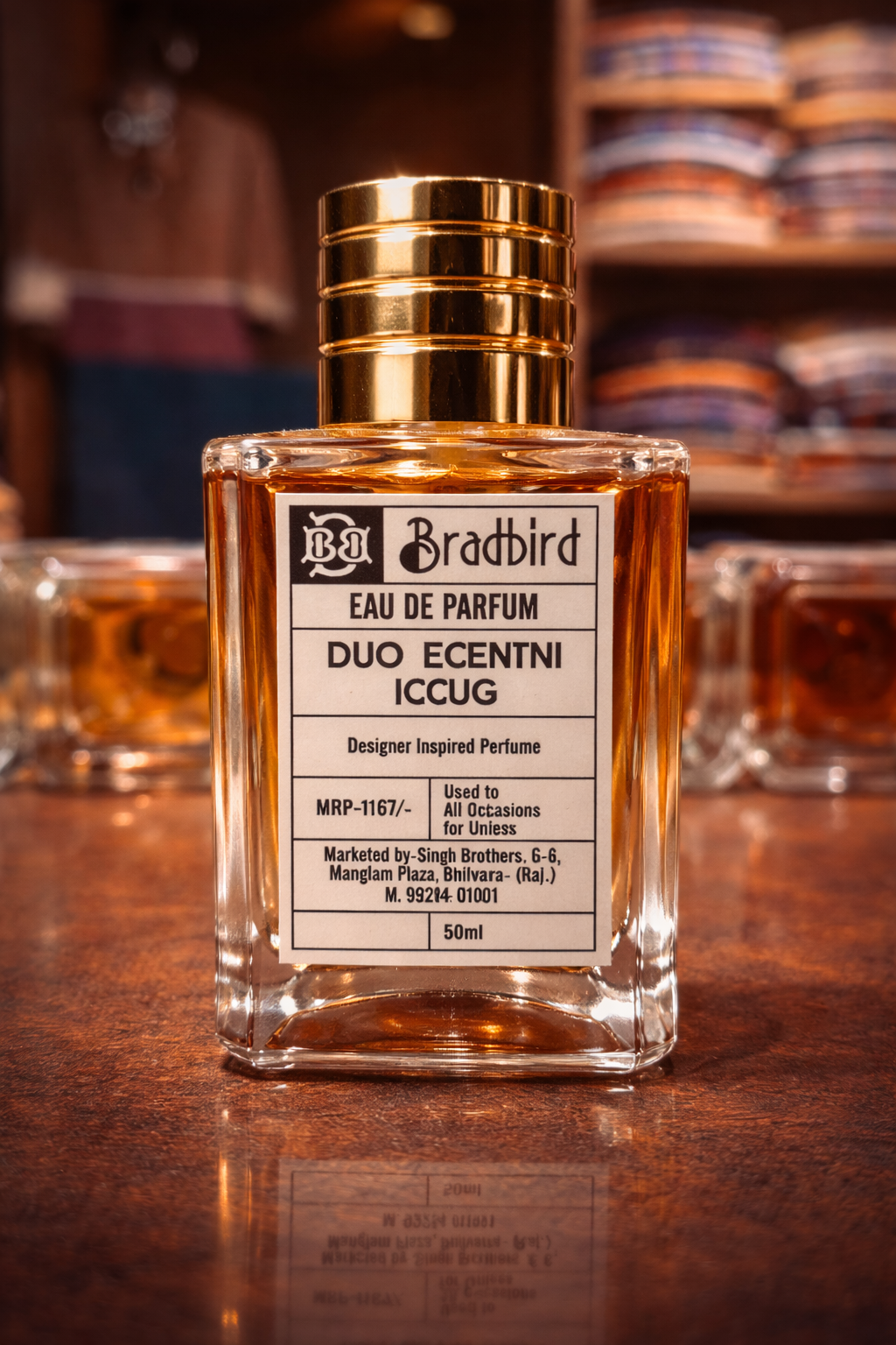 50ml Eau de Parfum bottle with gold cap and amber liquid, label facing camera