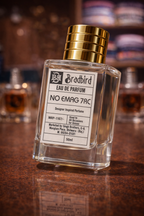 Eau de parfum bottle with label facing, gold cap, 50ml clear glass