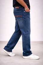 Blue denim straight jeans with embroidered back pockets and dark stitched seams