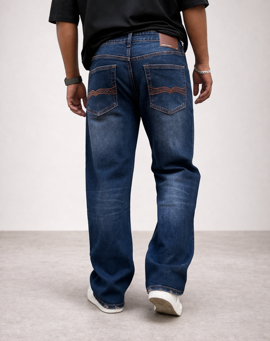 Indigo denim straight jeans with two front pockets and orange topstitching detail