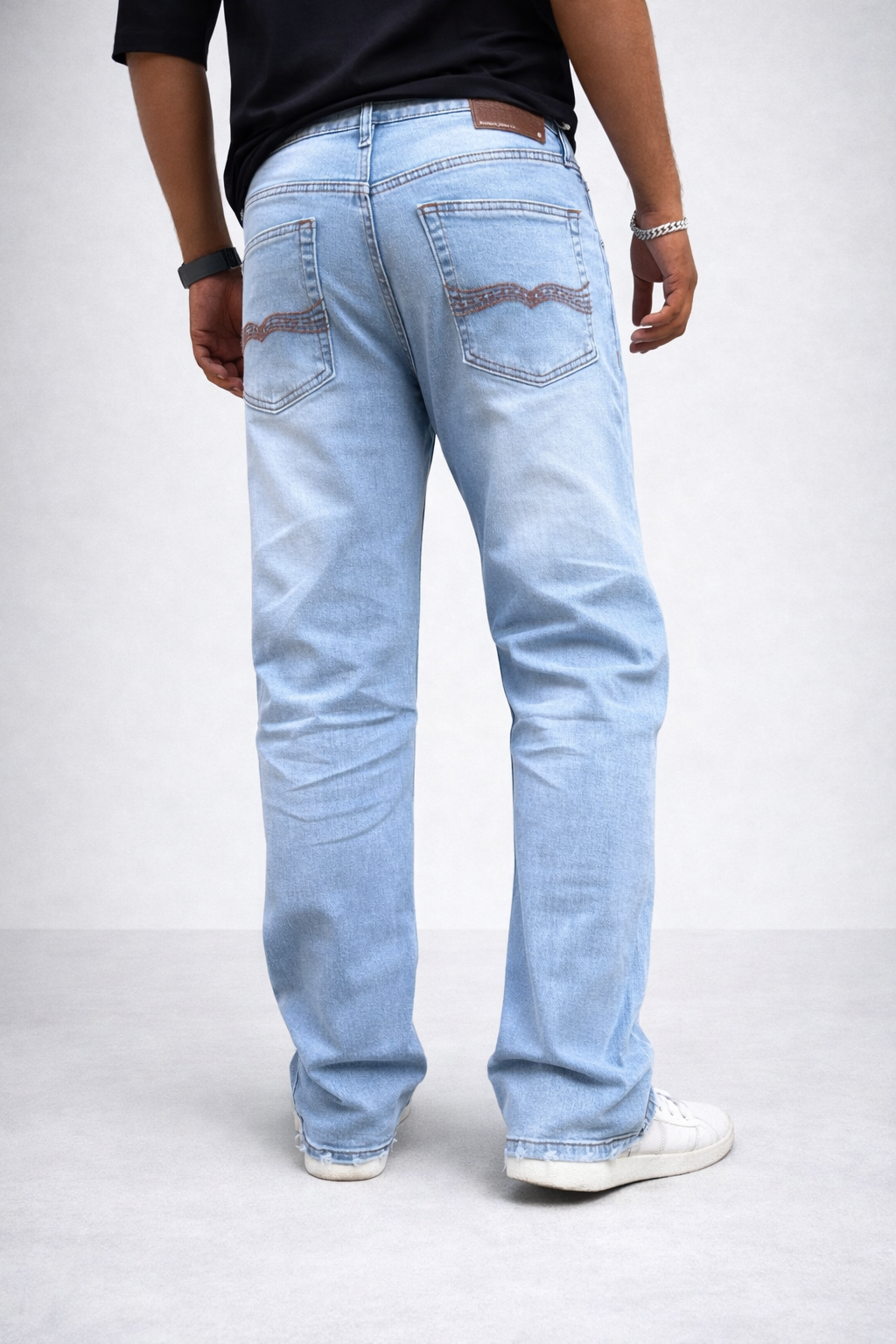 Ice blue straight-fit jeans, back view: yoke and back pockets, light wash stitching
