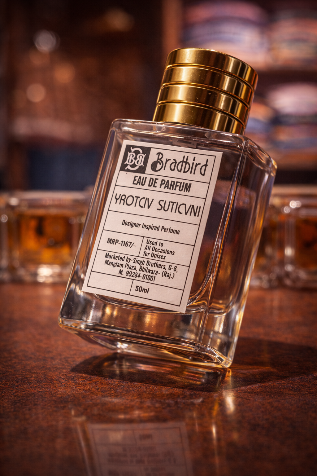 50 ml eau de parfum bottle with gold cap and angled label