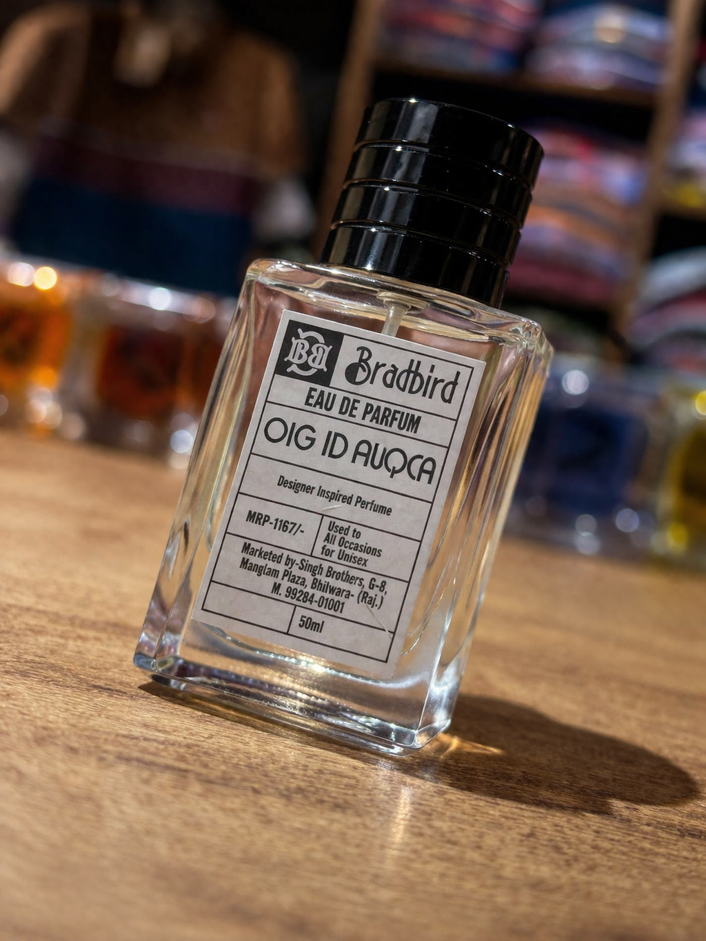 Unisex eau de parfum 50ml bottle with dark cap and side/front label on tabletop