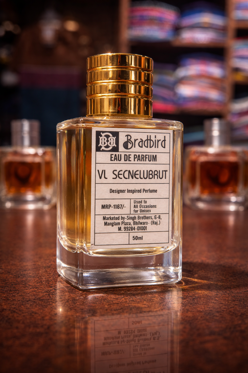Eau de Parfum bottle with gold cap and front label, 50ml
