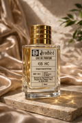 EB KC eau de parfum bottle with gold cap; clear glass, 50ml label visible